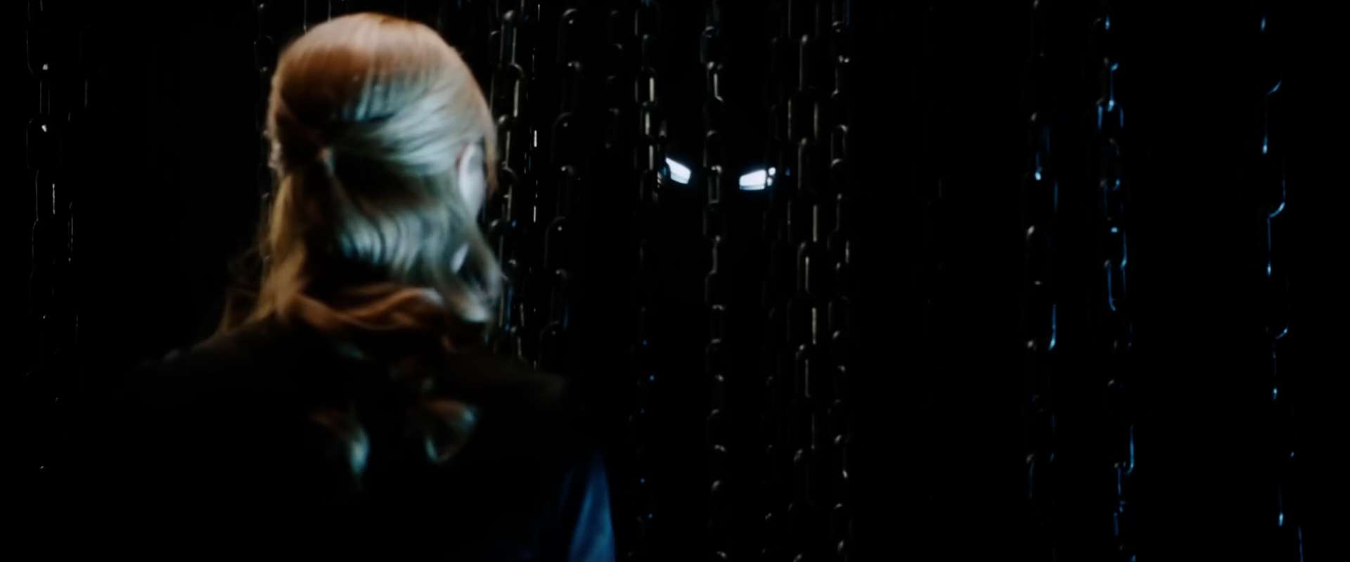 Gwyneth Paltrow staring down a robot in "Iron Man" (2008)