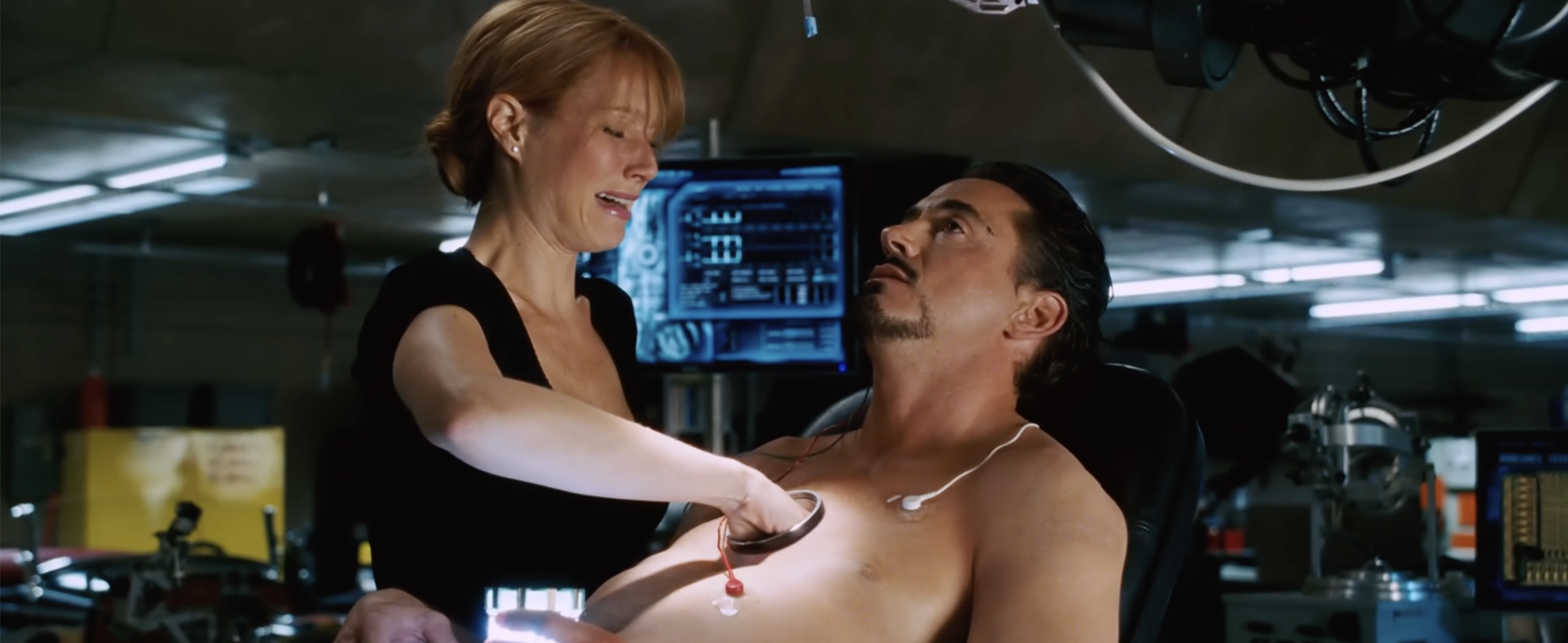 Gwyneth Paltrow and Robert Downey, Jr. in "Iron Man" (2008)